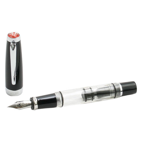 Diamond Mini Classic - Stub 1.5 fountain pen, clear-barrel, with visible piston, steel nib, and detached black cap with chrome trim and red emblem.