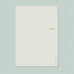 Wearingeul Nobile Notebook - A5 (Blank), off-white, 101gsm, fountain pen friendly, displayed on a pale green background. Ideal for ink color expression.