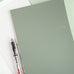 Wearingeul Nobile Notebook - A5 (Grid), featuring fountain pen friendly Nobile paper, alongside a fountain pen on grid paper; ideal for ink color expression.