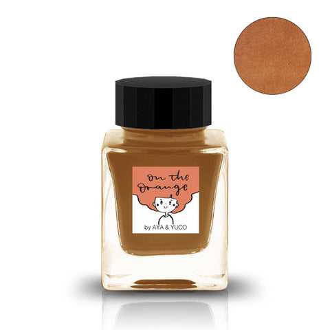 Tono & Lims On the Orange fountain pen ink, 30ml, in a square glass bottle with black cap, showcasing a warm brown-orange hue.