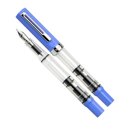 ECO (Pastel Blue) - Extra Fine fountain pen, capped and uncapped, features a clear barrel showing ink reservoir and piston mechanism, with pastel blue cap and end piece.