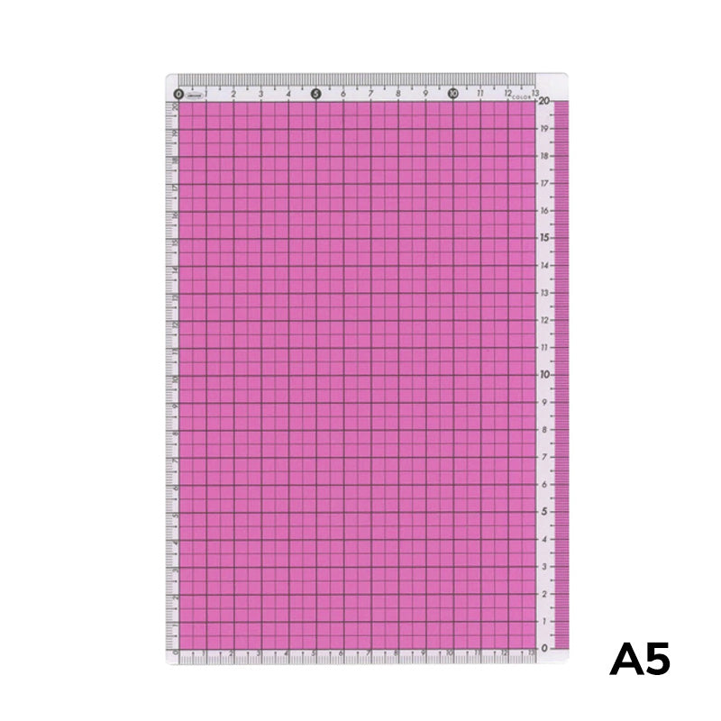 A5 Pencil Board (Pink) by Kokuyo, featuring a self-healing surface with 1 cm grid lines and rulers, perfect for precise measuring and trimming tasks.