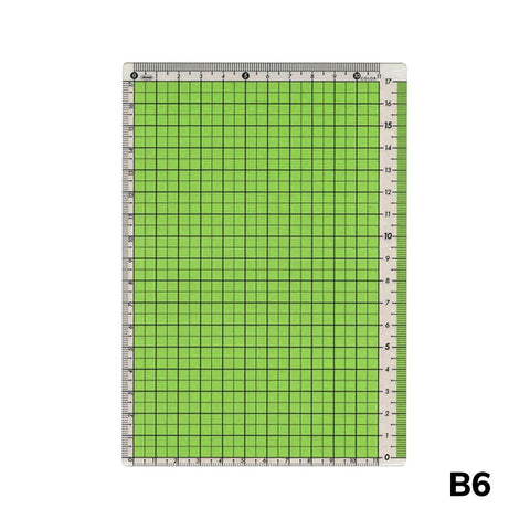 B6 Pencil Board (Green) by Kokuyo: A translucent grid mat with 1 cm gridlines and ruler markings, ideal for precise crafting, measuring, and alignment.
