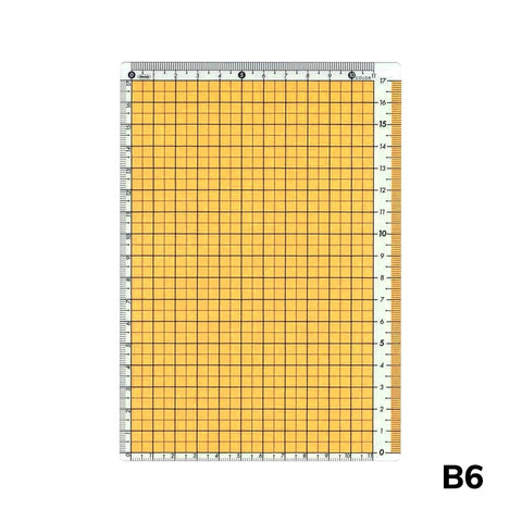 B6 Pencil Board (Orange) by Kyoei Orions features a grid layout with 1 cm squares and built-in rulers, ideal for precise sketches and layouts.