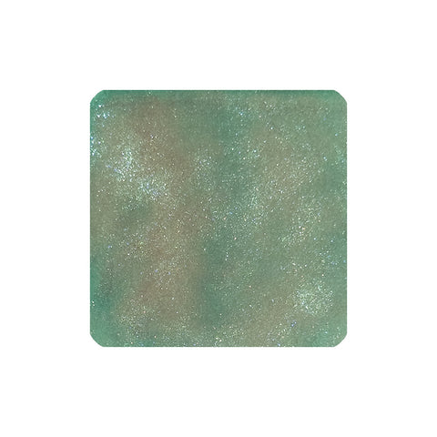 Tono & Lims Peridot Green (Shimmer) fountain pen ink, featuring a green-teal pearlescent texture with iridescent shimmer, in a 30ml bottle.