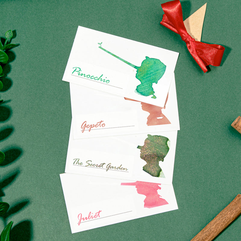 Wearingeul Pinocchio Ink Swatch Cards feature literary silhouettes on 200gsm paper, ideal for showcasing fountain pen ink characteristics. Pack includes 50 cards, suitable for themed displays.