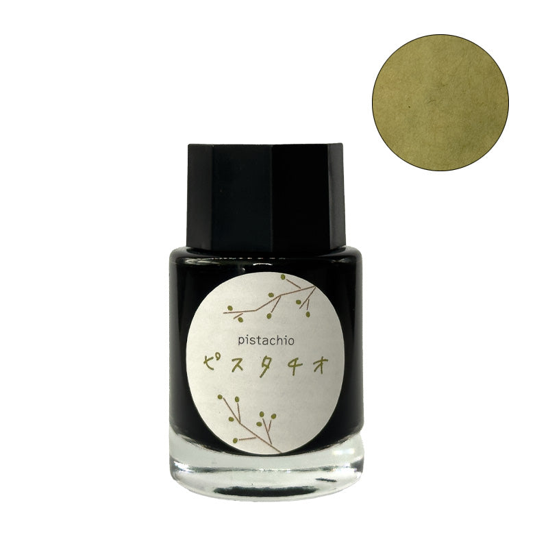 Ka-Ku Ink Mazeru / Pistachio - 18ml fountain pen ink, features a pistachio-green hue. The bottle is paired with a color swatch showcasing its pale green tone.