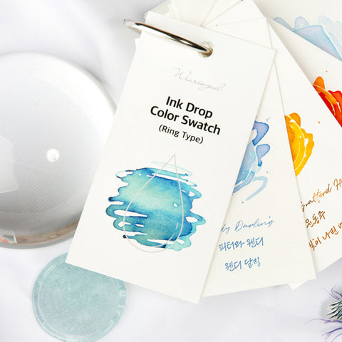 Wearingeul Ink Drop Swatch Cards (Ring Type) for fountain pen ink, featuring a ring-bound set of 100 cards with ink blotches and handwritten notes.