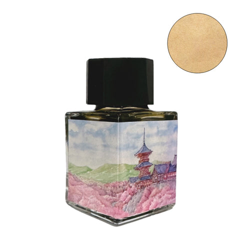 Fanyantan Sakura Snow fountain pen ink, 20ml glass bottle with a Japanese pagoda and cherry blossom label, features a unique yellow-green gradient with pink tones.