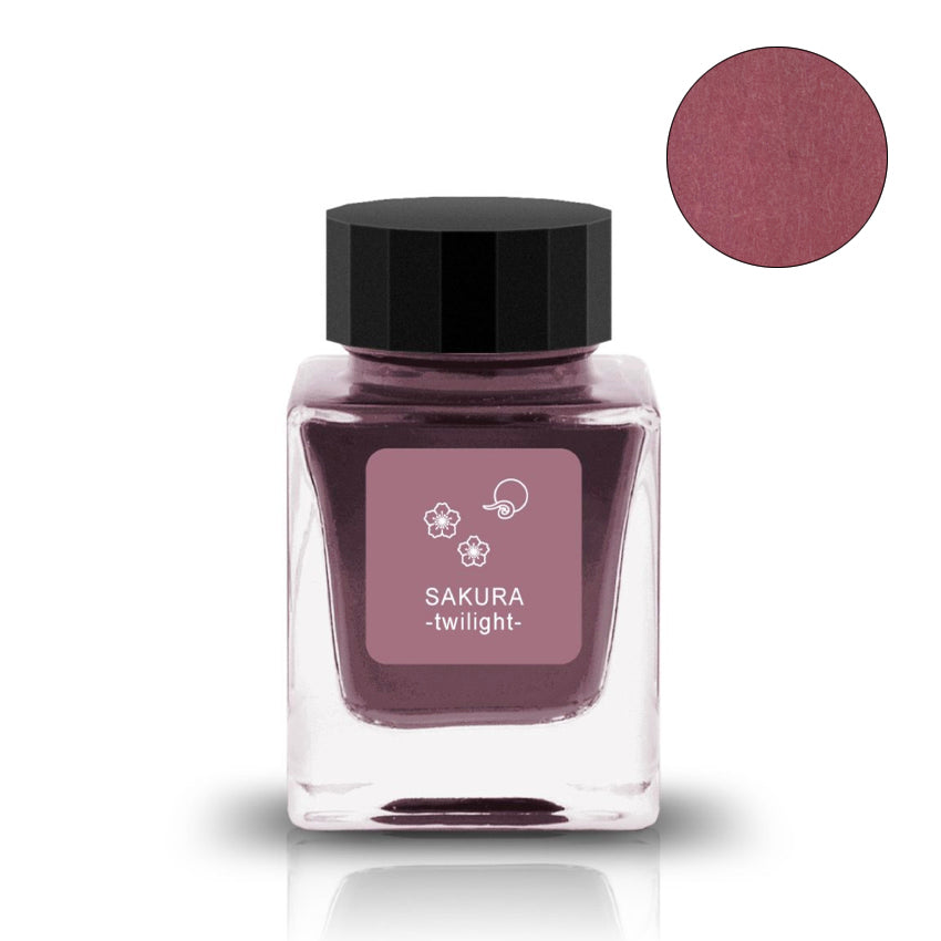 Sakura Twilight - 30ml: Square glass bottle of Tono & Lims fountain-pen ink with black lid, featuring a dusky cherry-blossom pink swatch.