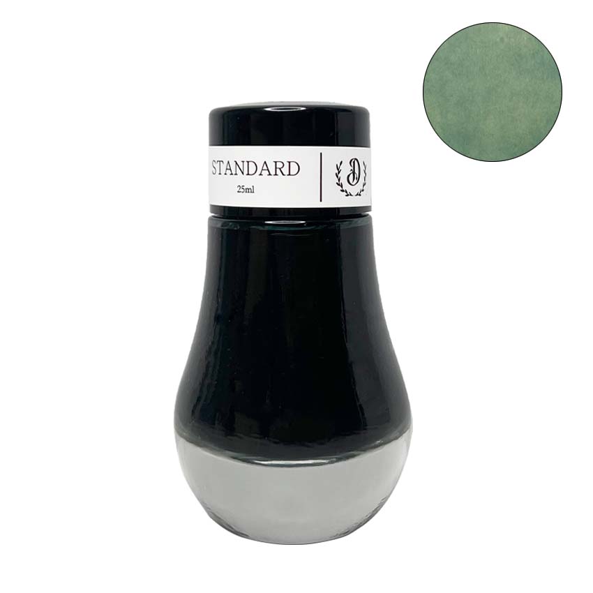 Seaweed - 25ml fountain pen ink by Dominant Industry, featuring a teardrop-shaped glass bottle and a mossy green swatch, from Desk Bandit's Standard Series.
