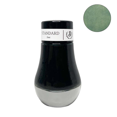 Seaweed - 25ml fountain pen ink by Dominant Industry, featuring a teardrop-shaped glass bottle and a mossy green swatch, from Desk Bandit's Standard Series.