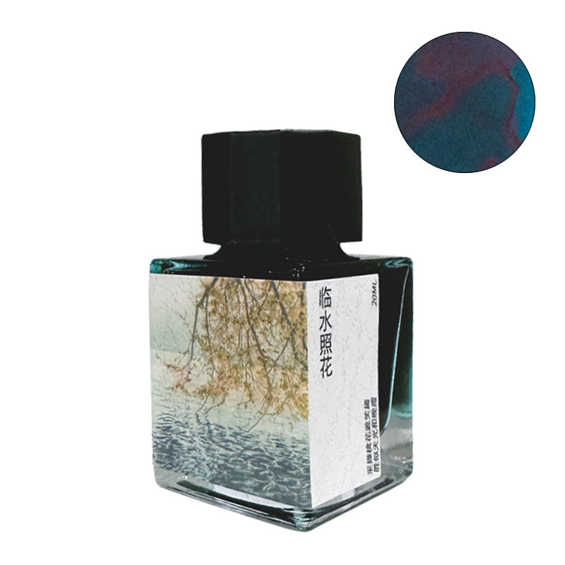 Fanyantan Shining Flowers On Water fountain pen ink, 20ml square bottle with hexagonal cap, features a waterside scene label and deep teal-blue ink with a red sheen.