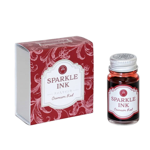 Sparkle Ink Dip Pen Ink - Crimson Red (12ml) by Teranishi, features shimmering dye-based ink in a screw-top glass bottle, paired with a decorative box.