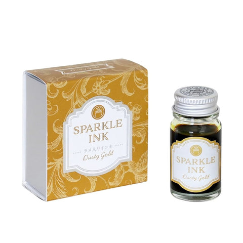 Teranishi Chemical Industry Sparkle Ink Dip Pen Ink - Dusty Gold (12ml), shimmering fountain pen ink in a glass bottle with a matching decorative box.