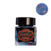 Journalize Starburst Glaze Shimmer fountain pen ink, 30ml glass bottle with black lid, deep shimmering blue and copper flecks, from Desk Bandit.