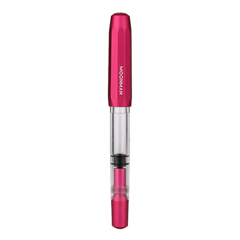 Moonman T1 (Pink) - Fine fountain pen with pink anodized cap, clear barrel, piston filler, and steel fine nib, showcasing ink level visibility.