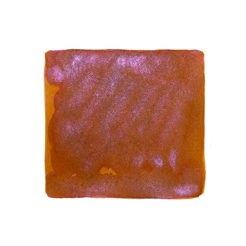 Wearingeul The Star Child Shimmer, 30ml fountain pen ink, shown as a glossy, textured orange-toned swatch with purple-metallic shimmer.