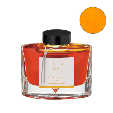 Pilot Iroshizuku Ink - To-ro, 50ml bottle, features an orange-amber hue, with a black cap and tied decorative cord, embodying Japanese landscape inspiration.