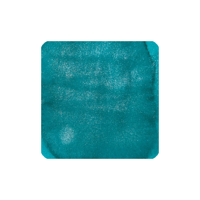 Tropical Glow (Shimmer) - 50ml fountain pen ink by Diamine, featuring a teal-blue watercolor texture with shimmering pearlescent highlights, ideal for vintage pens with regular maintenance.