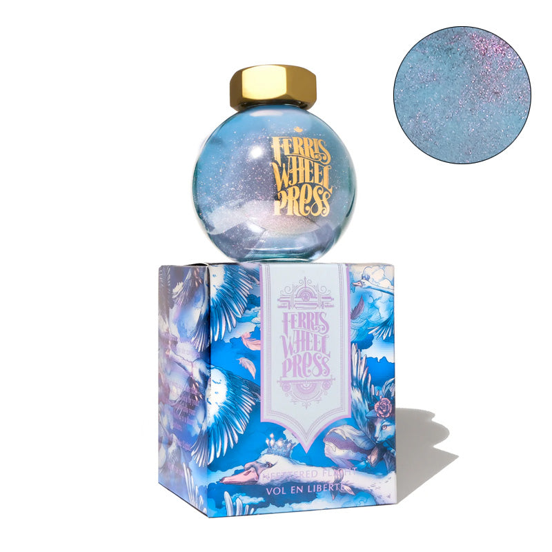 Ferris Wheel Press The Wild Swans - Unfettered Flight 85ml fountain pen ink in a snow-globe bottle, showcasing blue-lavender shimmer, atop its illustrated box.