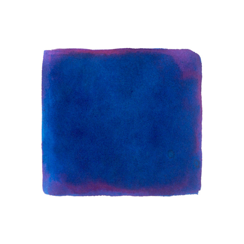 Wearingeul The Valley of Fear fountain pen ink, 30ml: a deep blue watercolor swatch with magenta-purple edges, showcasing unique shading and sheening effects.
