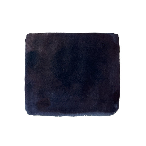 Warsaw Dreaming - 60ml KWZ Ink, iron gall-based fountain pen ink, presented in a soft, plush, dark cleaning pad against a white background.