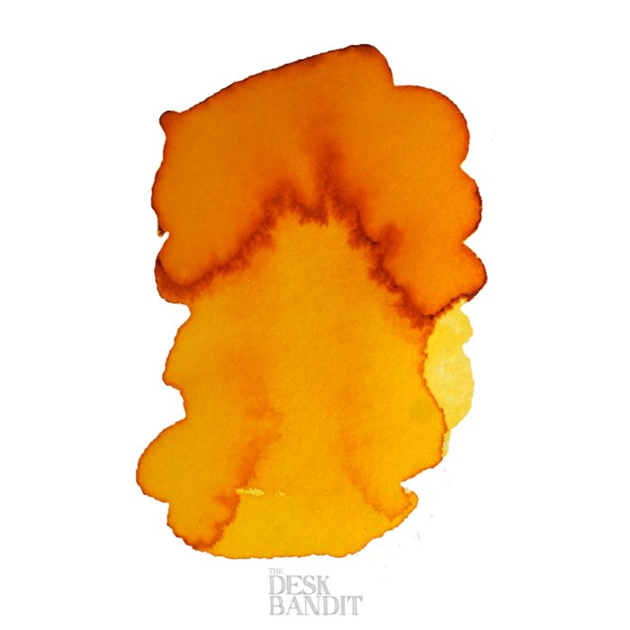 Yellow Sunrise - 2ml ink sample by Robert Oster, featuring an abstract orange-yellow watercolor swatch on a white background with a THE DESK BANDIT watermark.