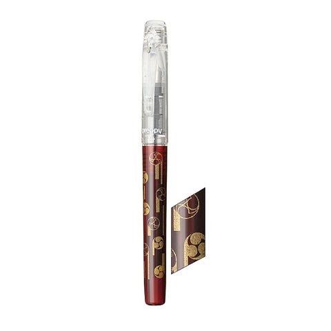 Preppy Wa Modern Maki-e Fountain Pen - Fine (Shima to Tomoe) with clear cap, deep red barrel featuring gold motifs, from Platinum's limited edition, showcasing elegant Japanese design.
