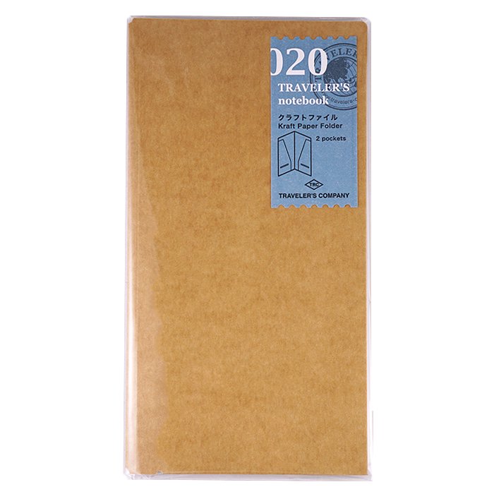 #020 Kraft Folder by Traveler’s Company, a slim kraft-paper insert with two internal pockets, shown sealed in clear packaging with a blue label.