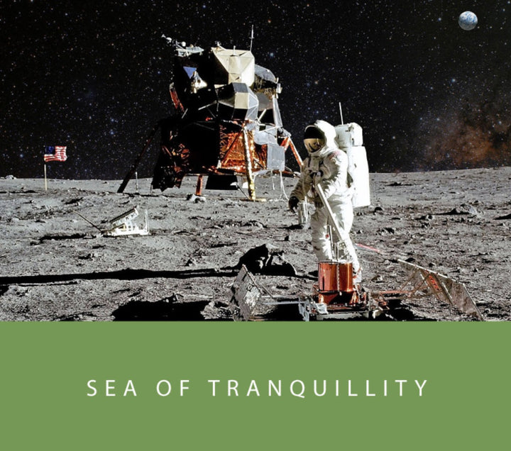 Sea of Tranquility - 65ml + 15ml Set. Astronaut on Moon's surface, U.S. flag, lunar module; olive-green base with title highlights ink’s celestial inspiration.