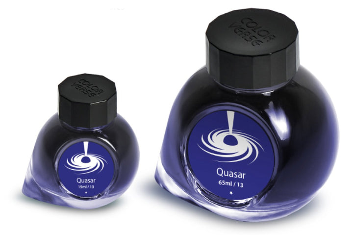 Quasar - 65ml + 15ml Set features two glass ink bottles with black octagonal caps, labeled with a swirling-galaxy logo from the Astrophysics Collection.