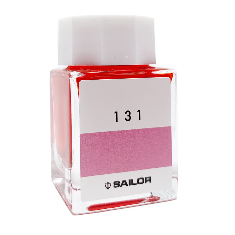 Sailor Ink Studio #131 - 20ml, a square glass bottle with a white cap, contains vibrant pink-red fountain-pen ink, exemplifying Sailor's curated color collection.