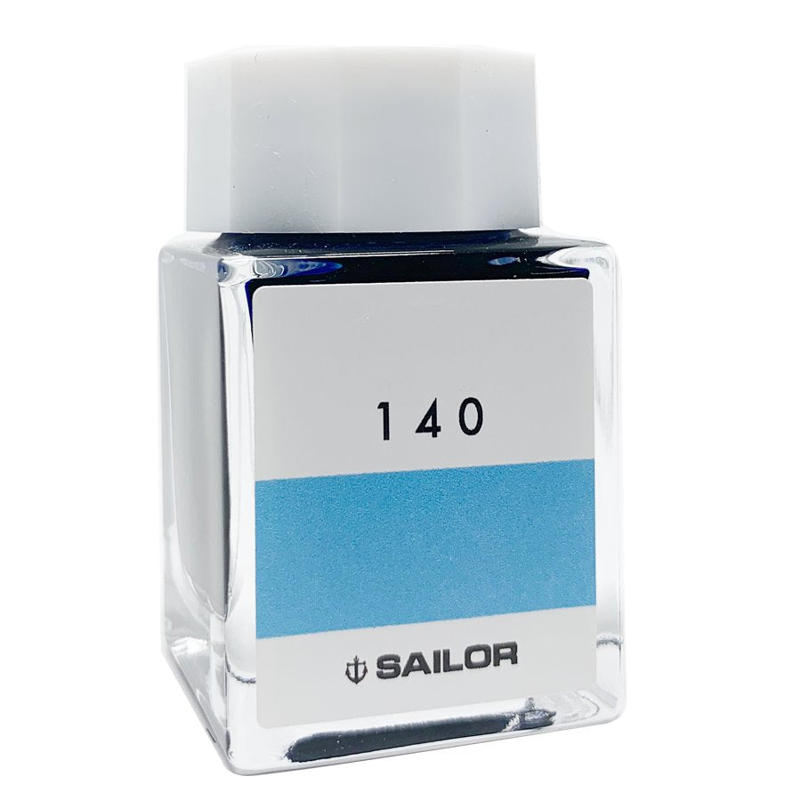 Sailor Ink Studio #140 - 20ml, a glass bottle with a white cap, features a label indicating light blue ink.