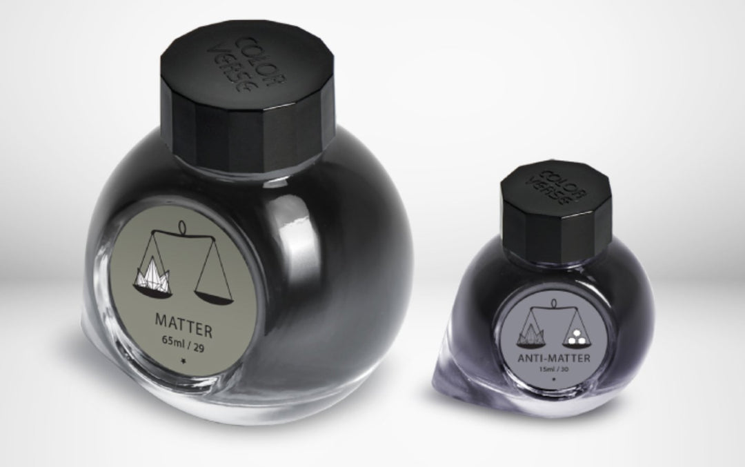 Colorverse Matter &amp; Anti-Matter ink set with 65ml and 15ml bottles, featuring stylized balance scale labels and black octagonal caps.