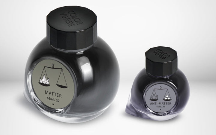Colorverse Matter & Anti-Matter ink set with 65ml and 15ml bottles, featuring stylized balance scale labels and black octagonal caps.