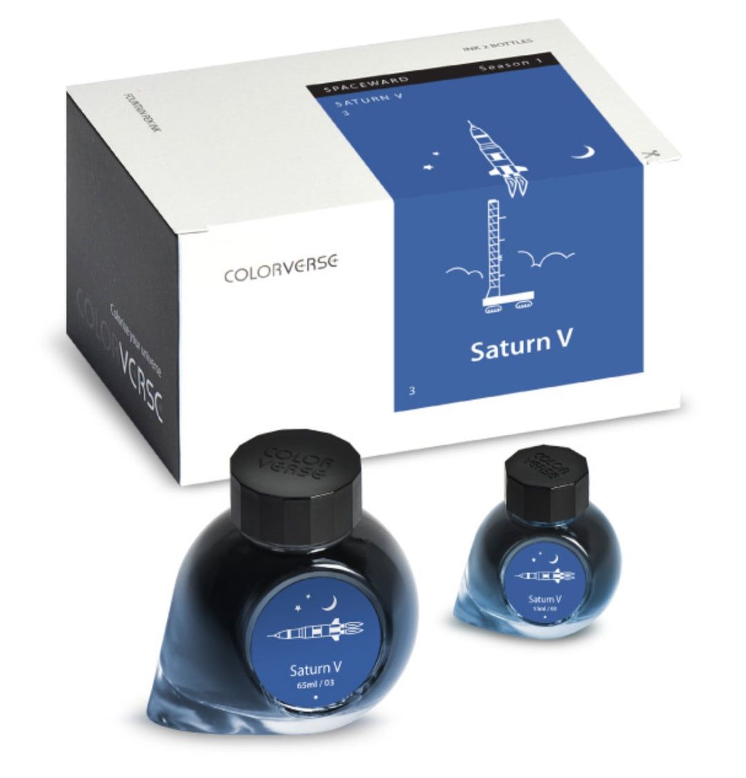 Saturn V - 65ml + 15ml Set: Boxed Colorverse inks with deep blue hue, featuring two unique glass bottles, a Saturn V rocket-themed white box, and accessories.