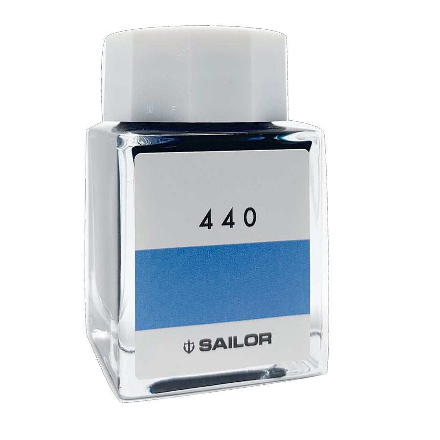 Square glass bottle of Sailor Ink Studio #440 - 20ml, featuring a white cap and blue-striped label, showcasing Sailor's extensive 100-color collection.