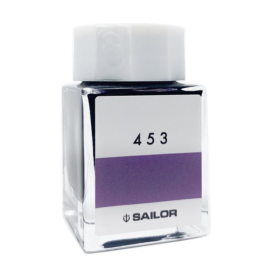 Square glass bottle of Sailor Ink Studio #453, featuring a label with 453 and SAILOR, filled with 20ml of dye-based ink.