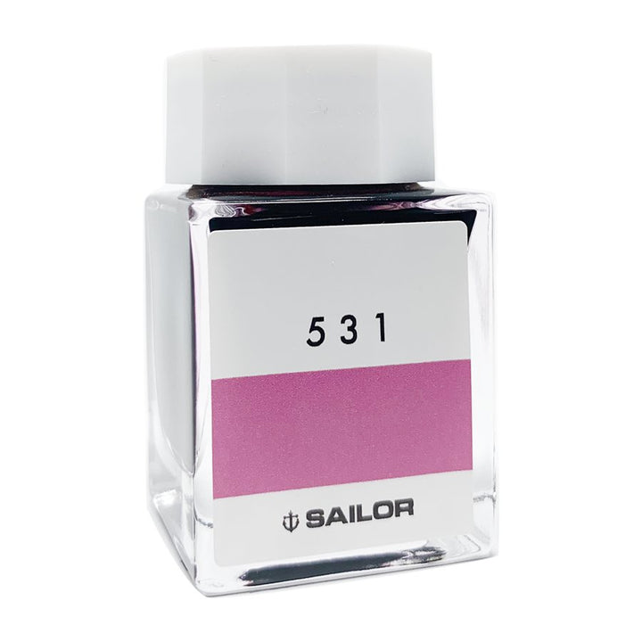Ink Studio #531 - 2ml: A small rectangular glass bottle of Sailor fountain-pen ink, featuring a white cap and pink labeled 531 on the front.