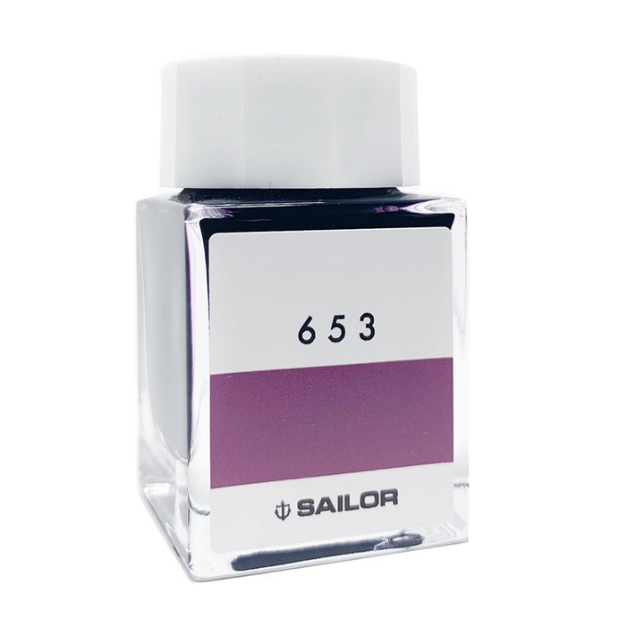 Sailor Ink Studio #653 - 20ml, square glass bottle, features purple-toned dye-based ink. Compact size, ideal for fountain-pen enthusiasts seeking curated shades.