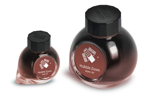 Hubble Zoom - 65ml + 15ml Set featuring two glass ink bottles with faceted black lids from Colorverse's Spaceward Collection, emphasizing premium, plant-based fountain-pen ink.