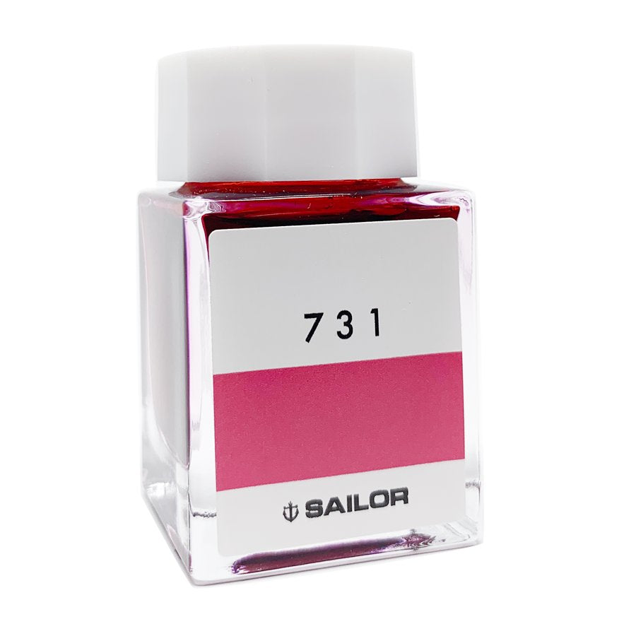 Square glass bottle of Sailor Ink Studio #731, featuring a white cap and a pinkish-red ink swatch on the label, 20ml dye-based ink.