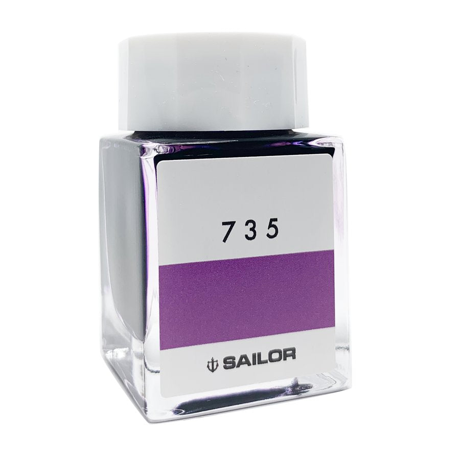 Ink Studio #735 - 20ml: A small square glass bottle of Sailor fountain-pen ink with a white cap and label, featuring the number 735 above a purple band.