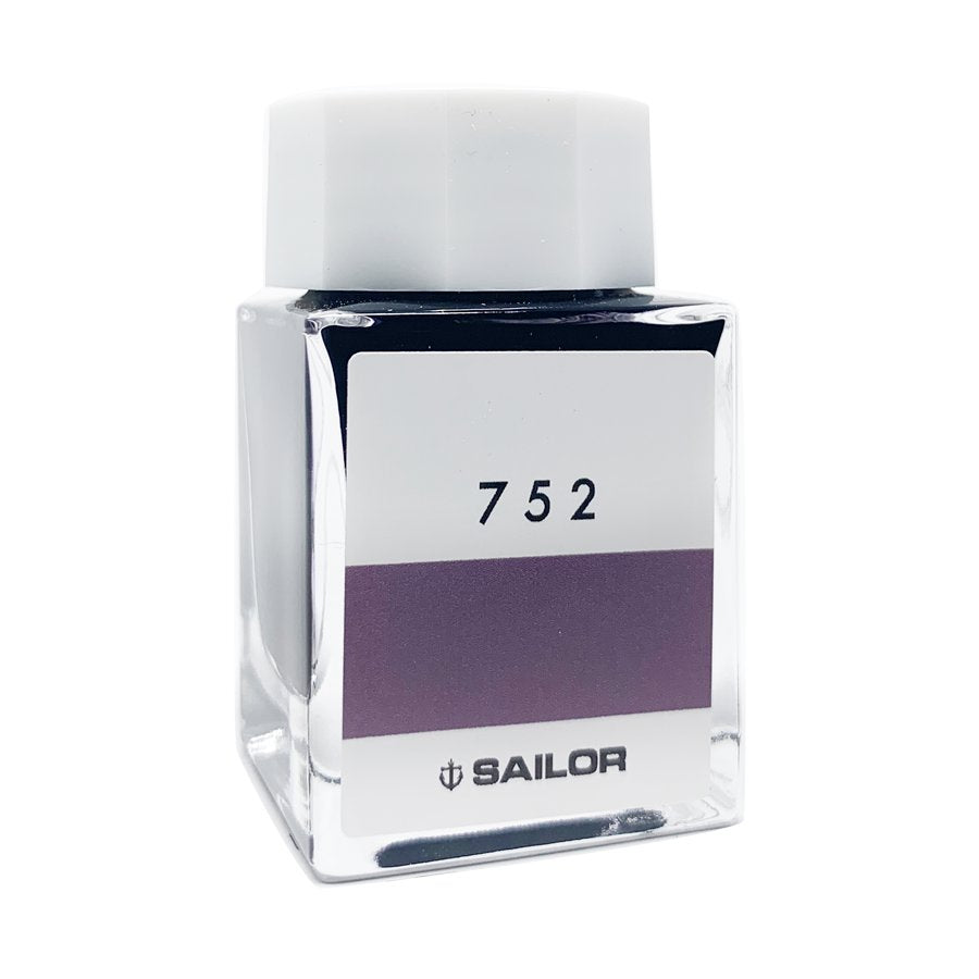 Ink Studio #752 - 20ml: A square glass bottle with a white cap, featuring a label with 752 and SAILOR beneath a purple ink swatch.