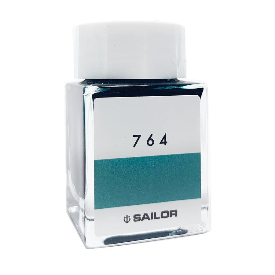 Square glass bottle of Sailor Ink Studio #764, 20ml, with a teal-green label band, showcasing a dye-based fountain-pen ink by Sailor.