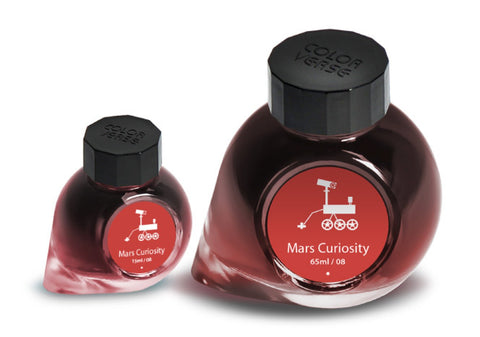 Two glass bottles of Colorverse ink, Mars Curiosity set, featuring dark red ink, black caps, and a Mars rover icon on red labels.