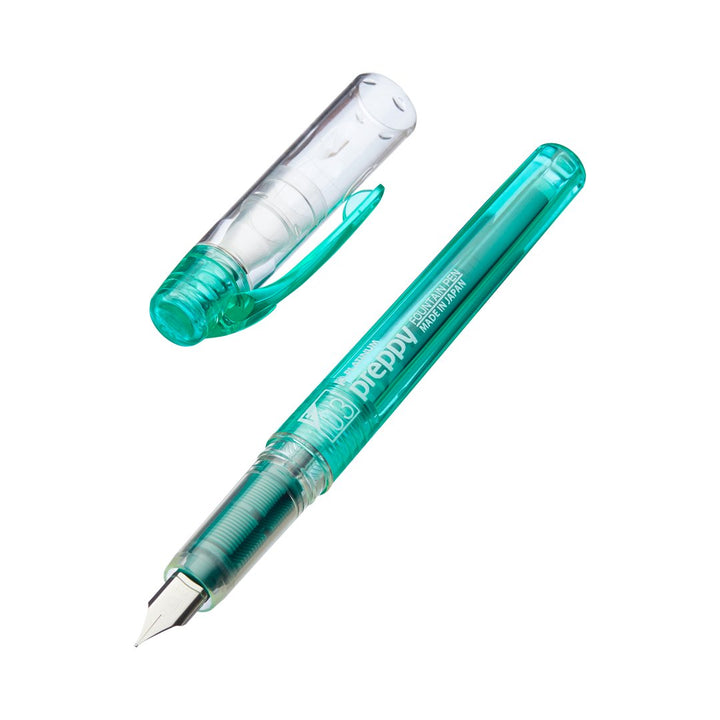 Preppy - Fine (Green) fountain pen with transparent teal-green barrel, visible nib, and ink feed. Features a slip & seal mechanism and includes one ink cartridge.