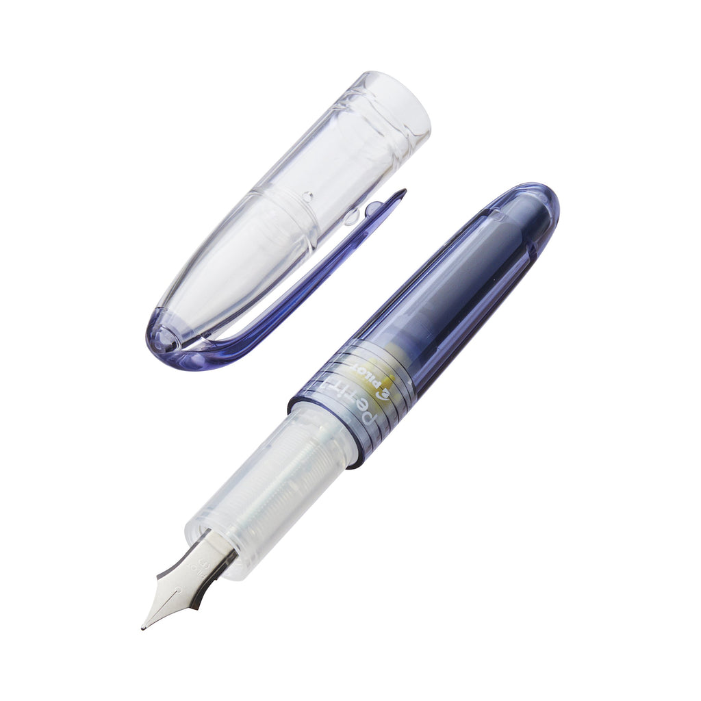Petit1 Mini - Fine (Blue Black) fountain pen with transparent barrel, visible metal nib, and ink cartridge, designed for portability and a fun writing experience.