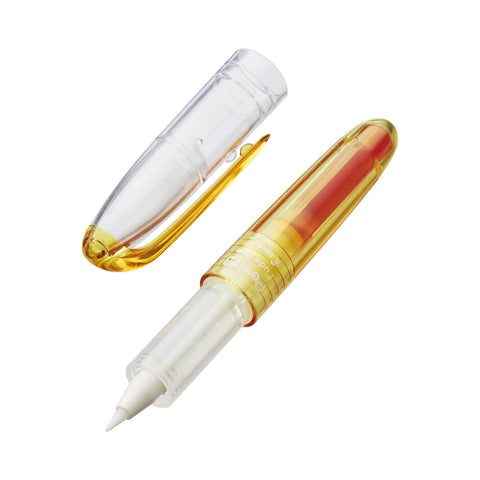 Petit3 Mini Fude Brush Pen - Orange with amber barrel, clear cap, visible white conical nib, and plastic feed. Compact design with proprietary cartridge.